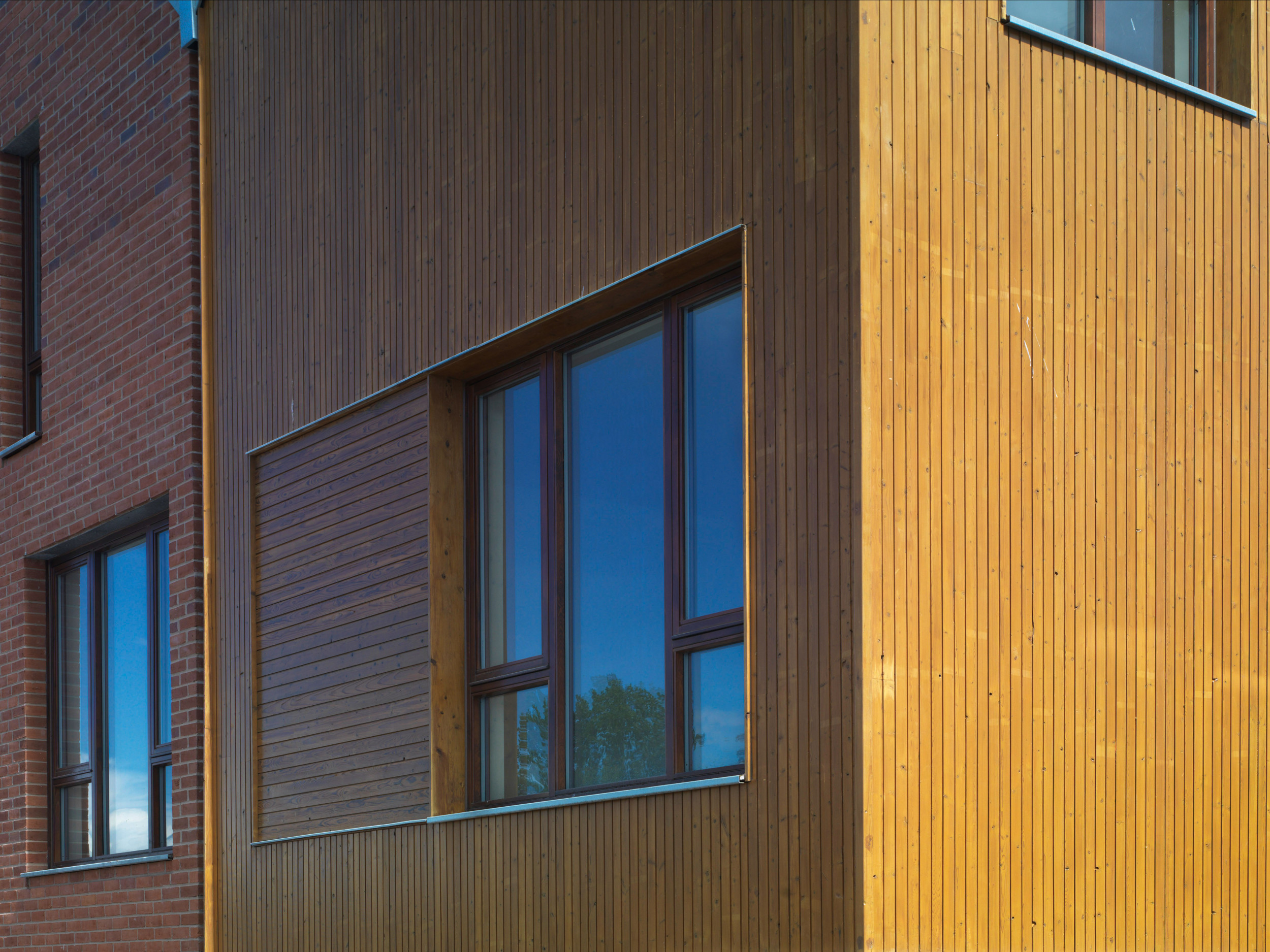 mwai TELFORD front entrance villa cladding abstract windows 2