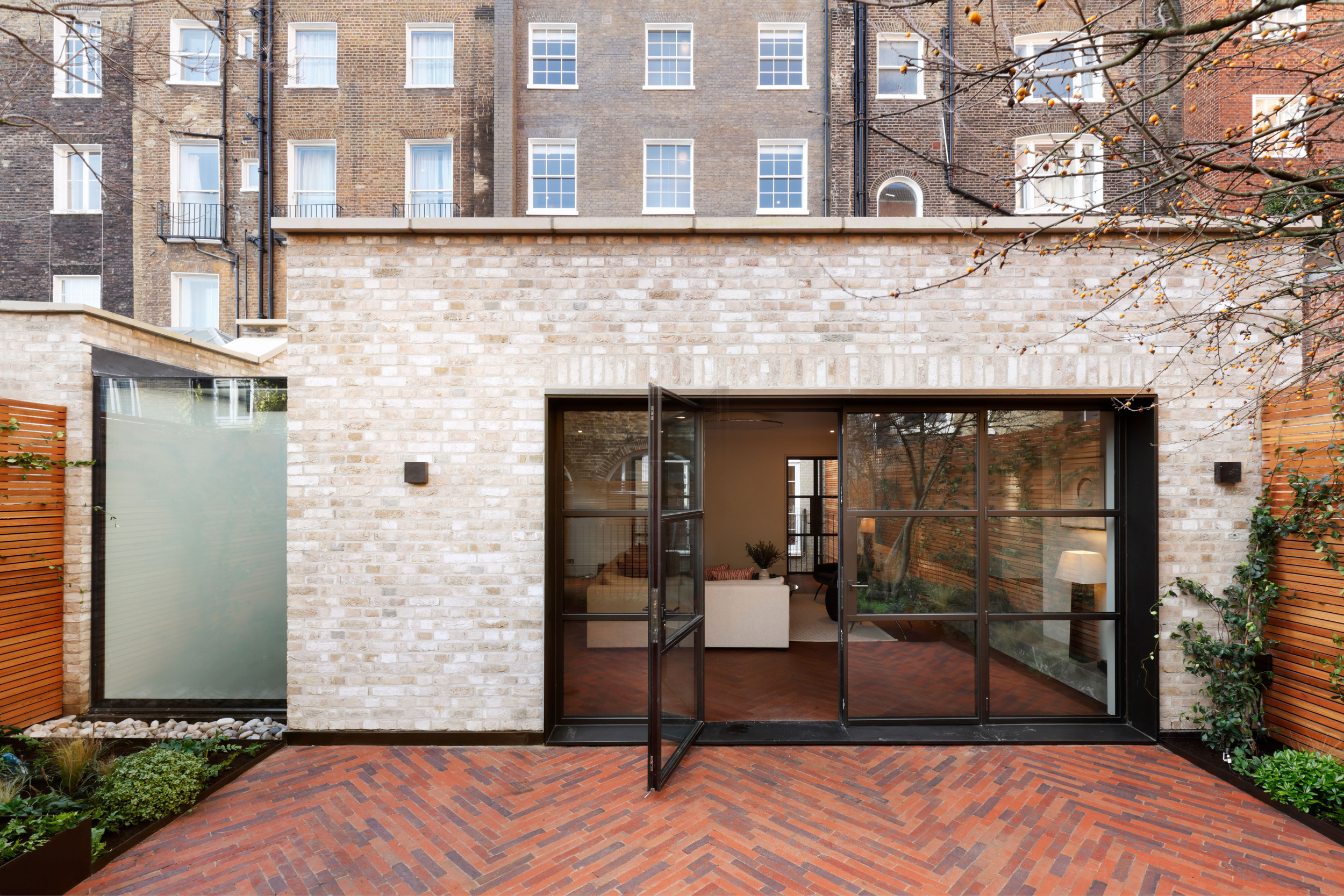 mwai devonshire place rear extension exposed brick Listed building