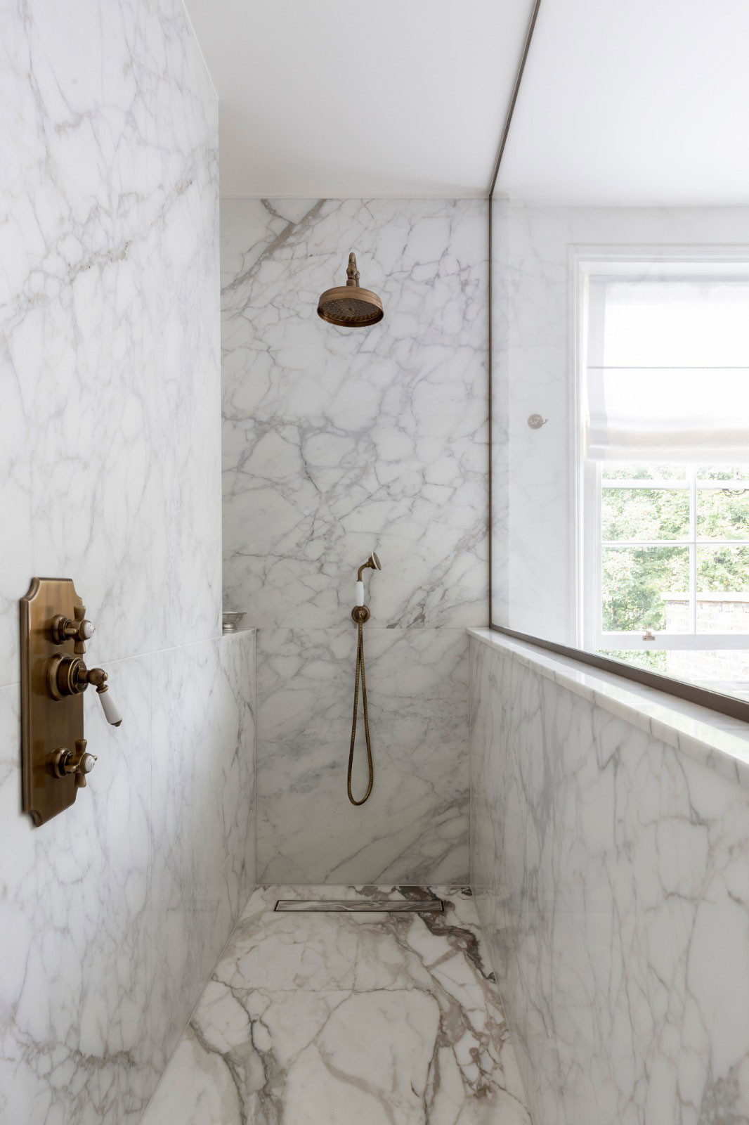mwai south kensingon white marble traditional Brass fixtures
