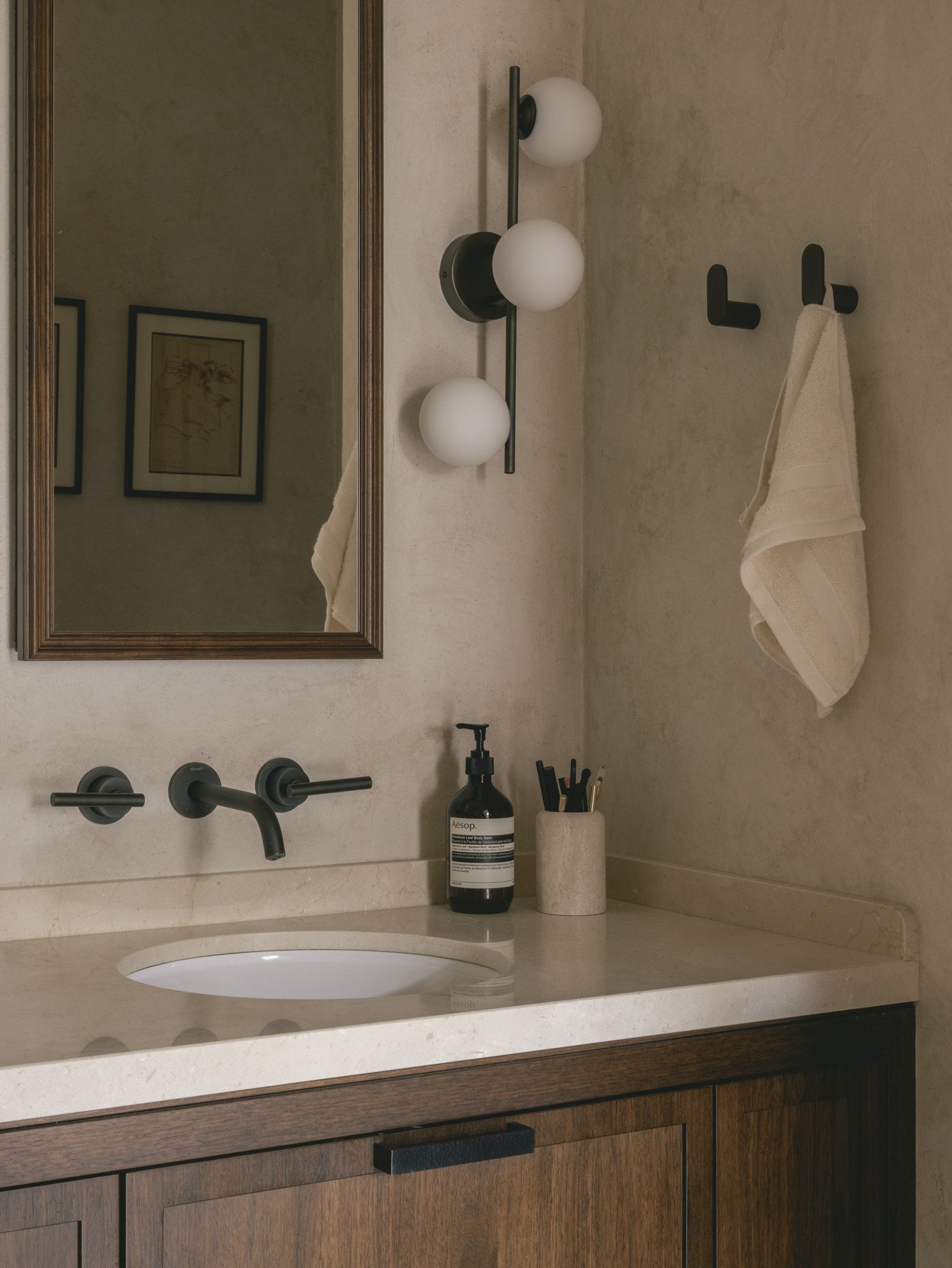 mwai a home reimagined masterbath microcement bespoke vanity recess mirror luxury residential