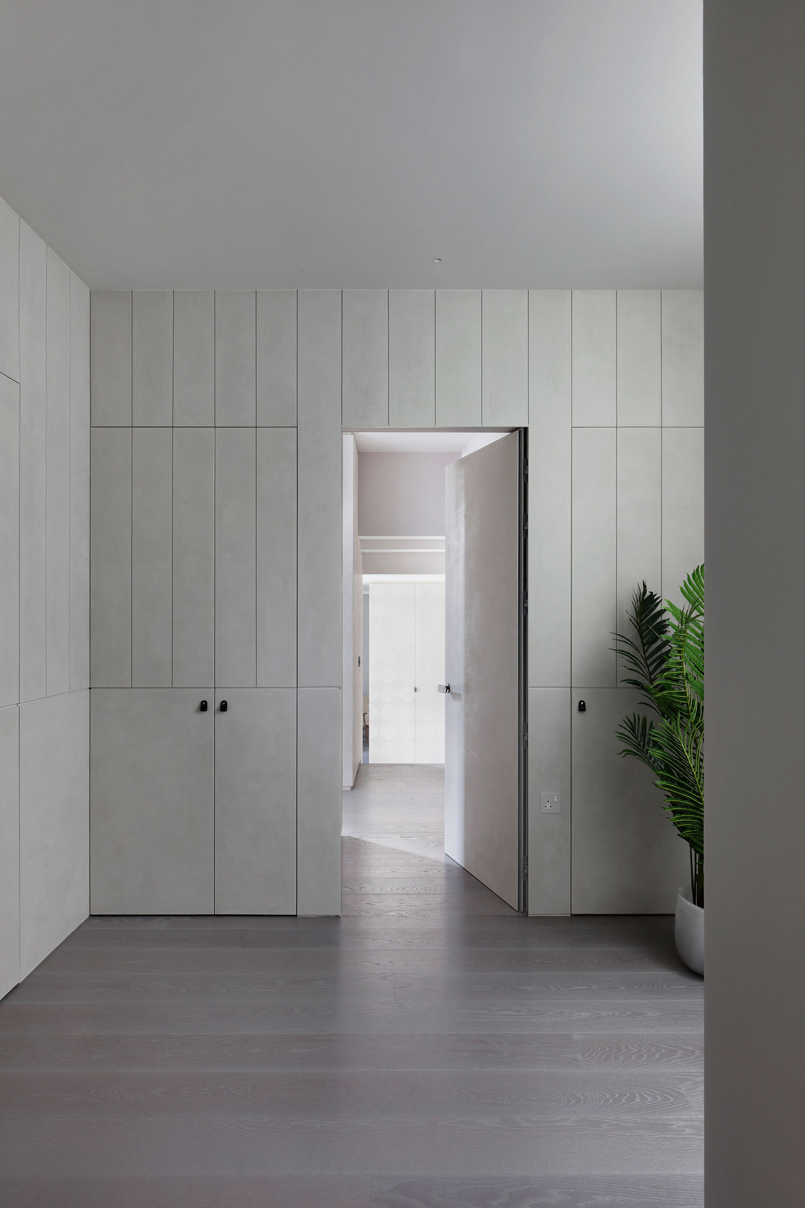MWAI hallway polished plaster minimal doorway light